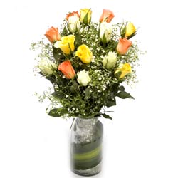 mix roses in a glass vase